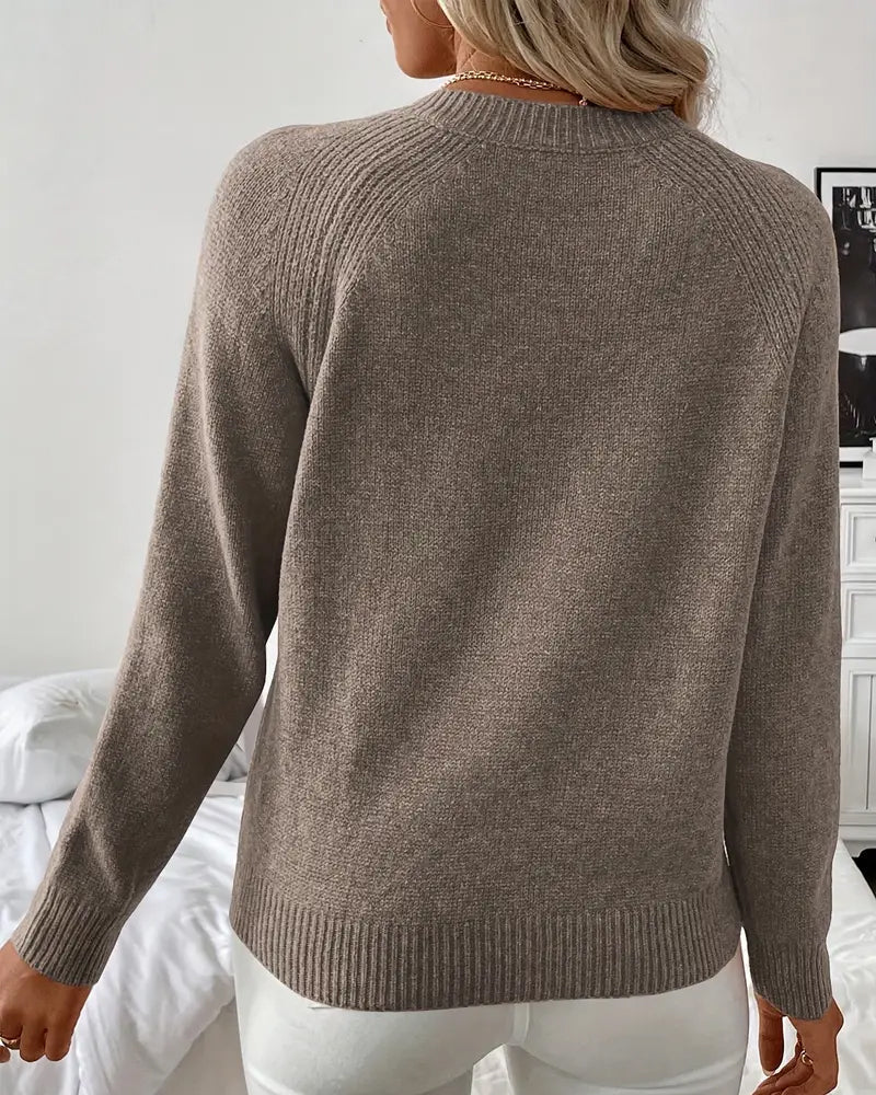 Sweter z knapppynt w raglanermer