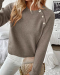 Sweter z knapppynt w raglanermer